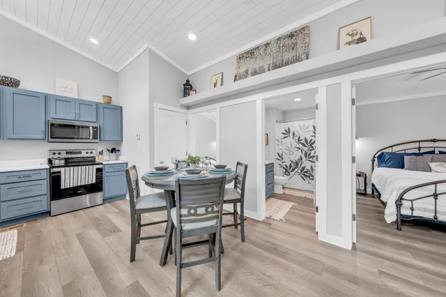 a dining room with wooden floor