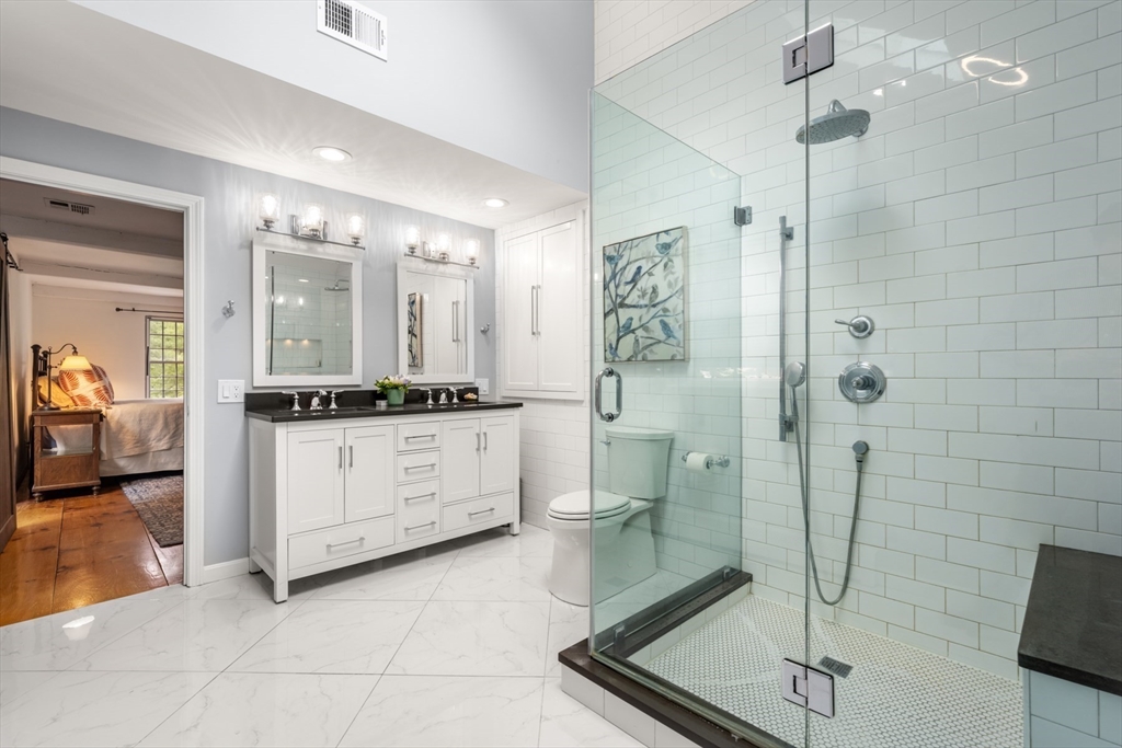 41 Longmeadow Road Wellesley, MA 02482 - Photo 24 of 41 a bathroom with a double vanity sink toilet and shower