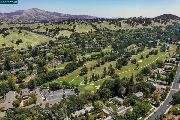 a view of a park with an trees