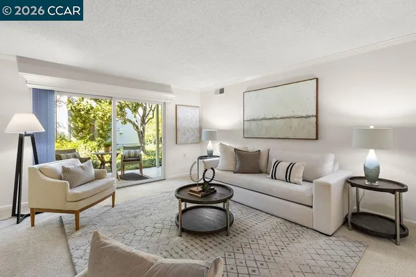 a kitchen with sink a stove and cabinets
