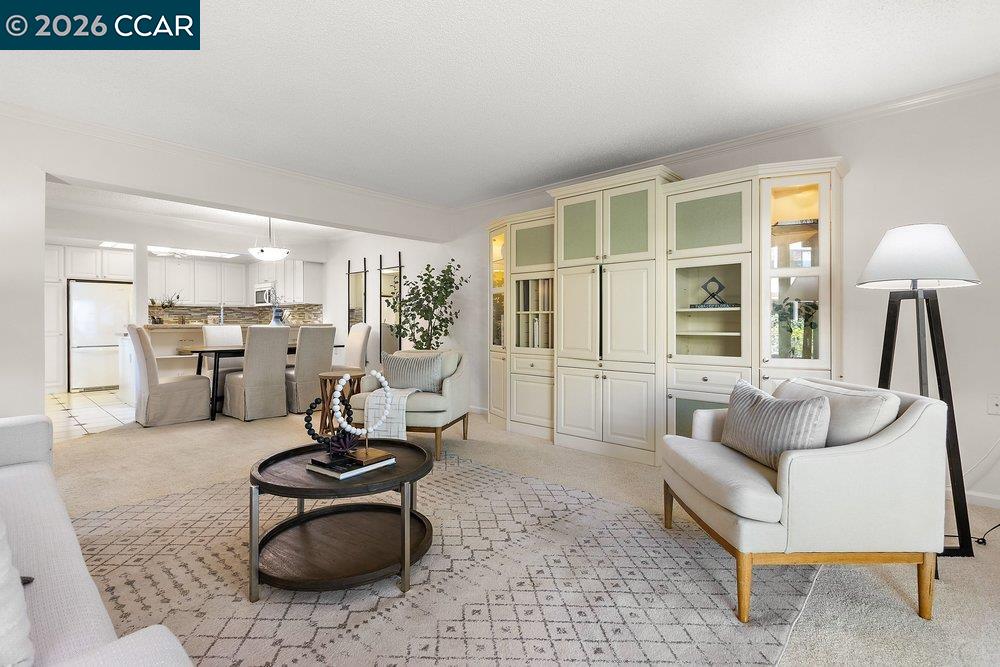 2057 Golden Rain Road, Unit 8 Walnut Creek, CA 94595 - Photo 46 of 60 a living room with furniture and a couch