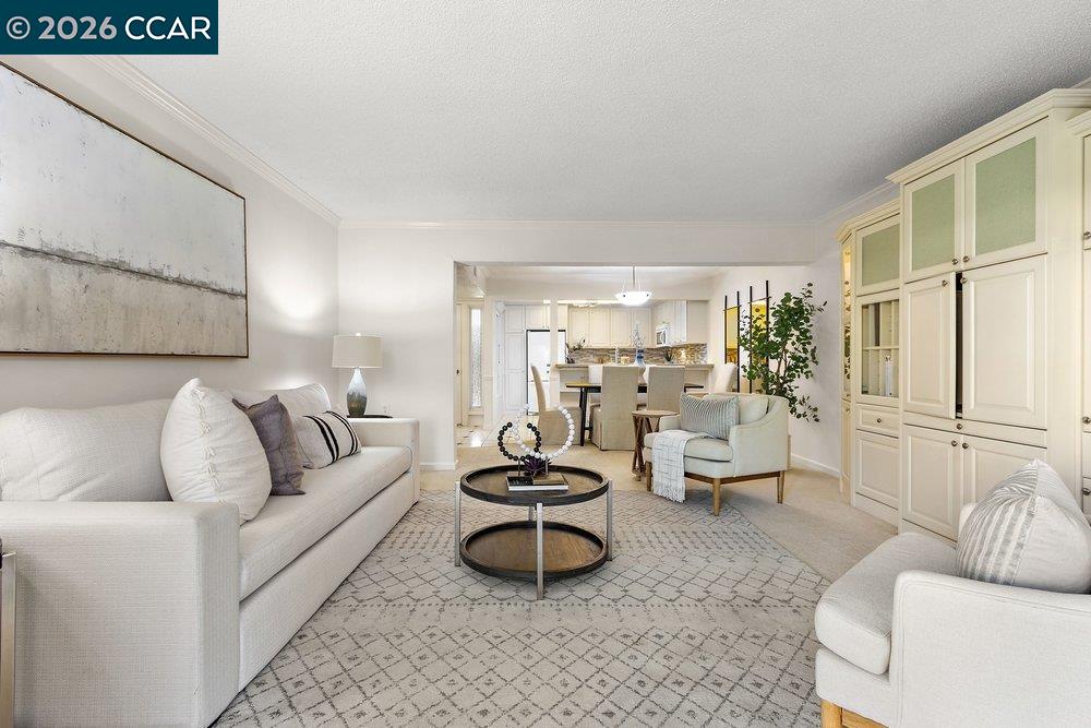 2057 Golden Rain Road, Unit 8 Walnut Creek, CA 94595 - Photo 47 of 60 a living room with furniture and a large window