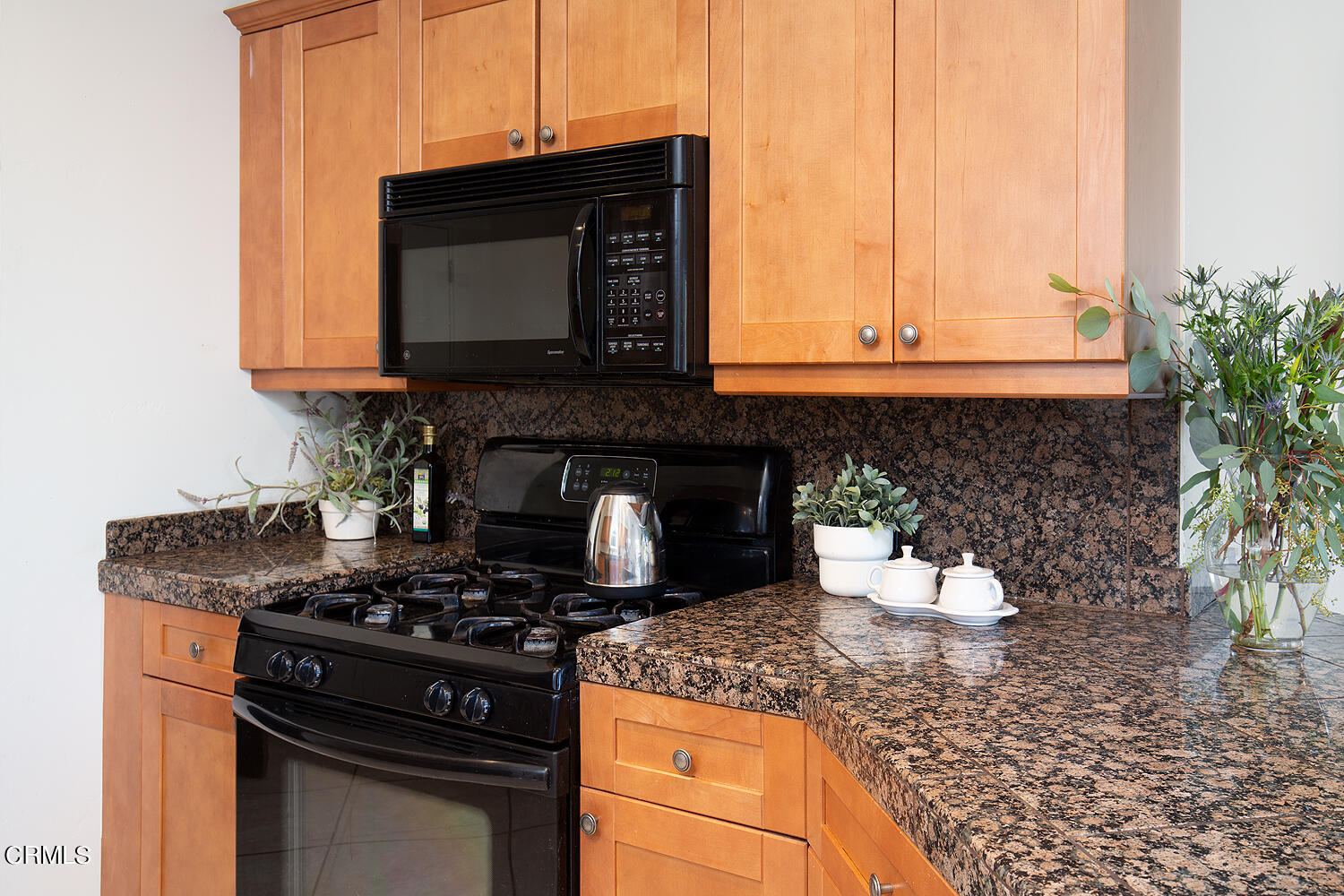 1273 Crescent Drive Glendale, CA 91205 - Photo 14 of 34 a kitchen with a stove and a microwave