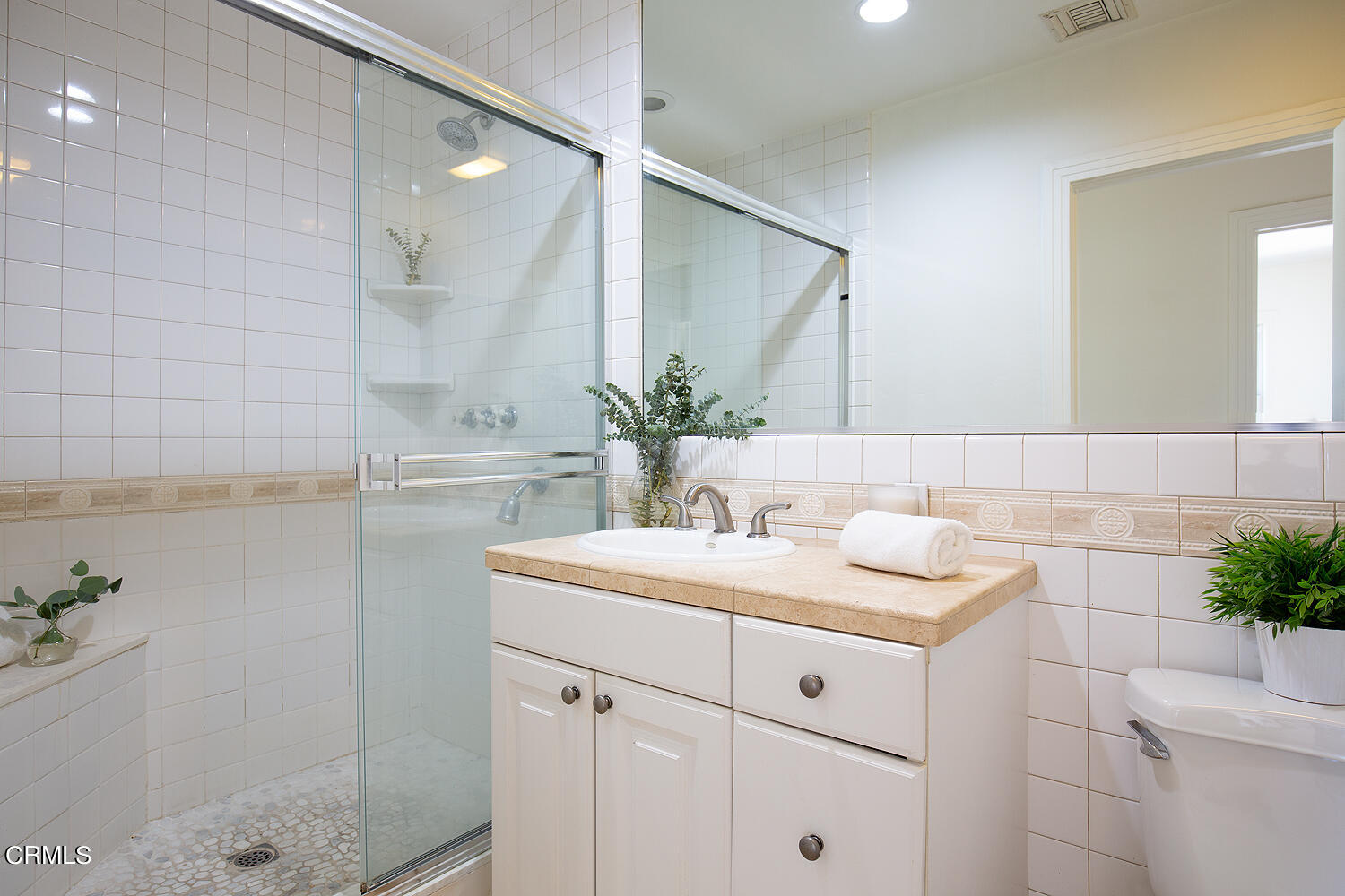 1273 Crescent Drive Glendale, CA 91205 - Photo 17 of 34 a bathroom with a sink and a mirror