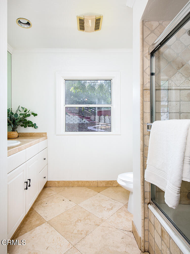 1273 Crescent Drive Glendale, CA 91205 - Photo 20 of 34 a view of an empty room with a window