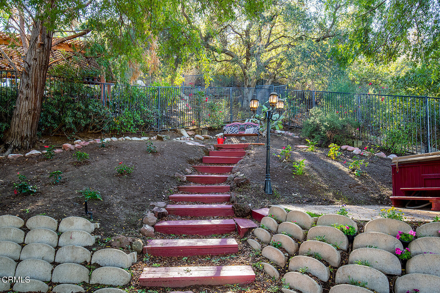 1273 Crescent Drive Glendale, CA 91205 - Photo 23 of 34 a view of a chairs and table in a backyard