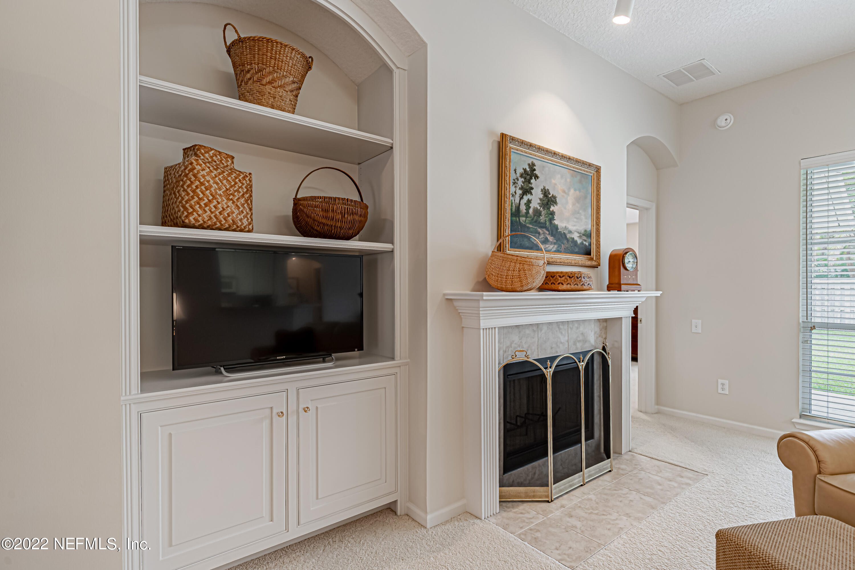 124 Dragonfly Drive Jacksonville, FL 32259 - Photo 14 of 40 a living room with furniture and a fireplace