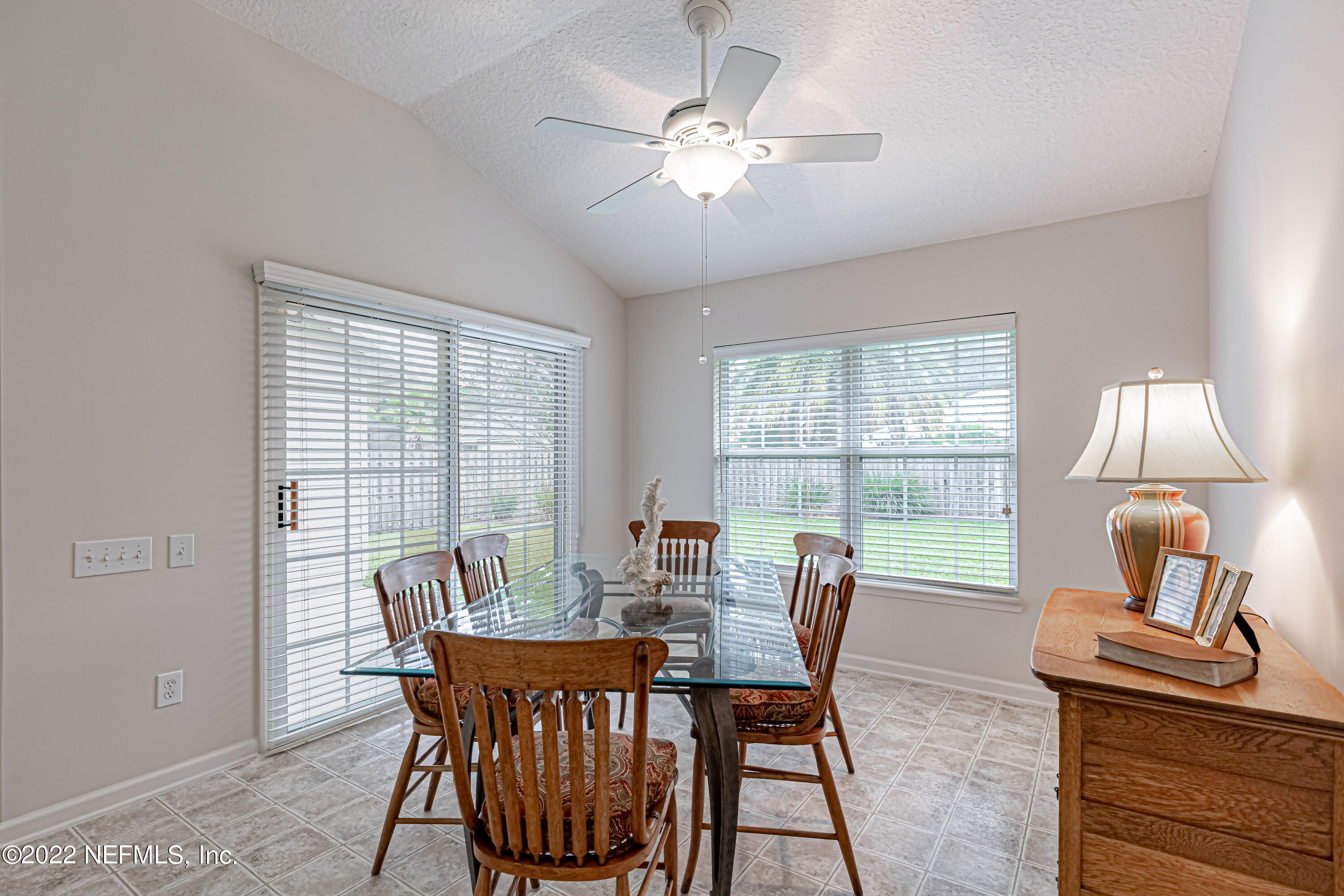 124 Dragonfly Drive Jacksonville, FL 32259 - Photo 20 of 40 a view of a dining room with furniture window and outside view