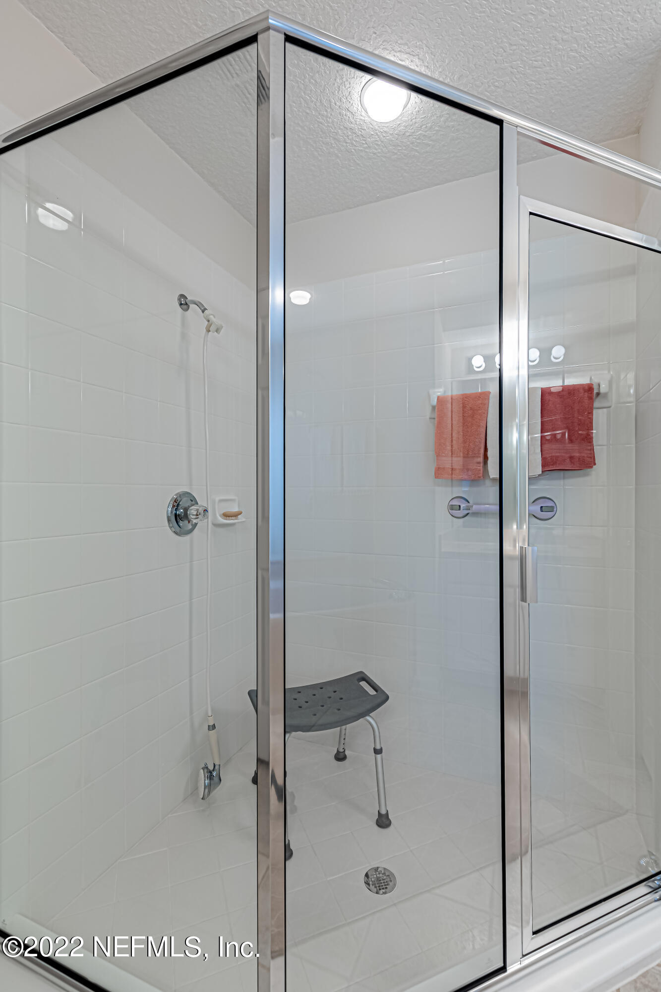 124 Dragonfly Drive Jacksonville, FL 32259 - Photo 28 of 40 a bathroom with a glass shower door