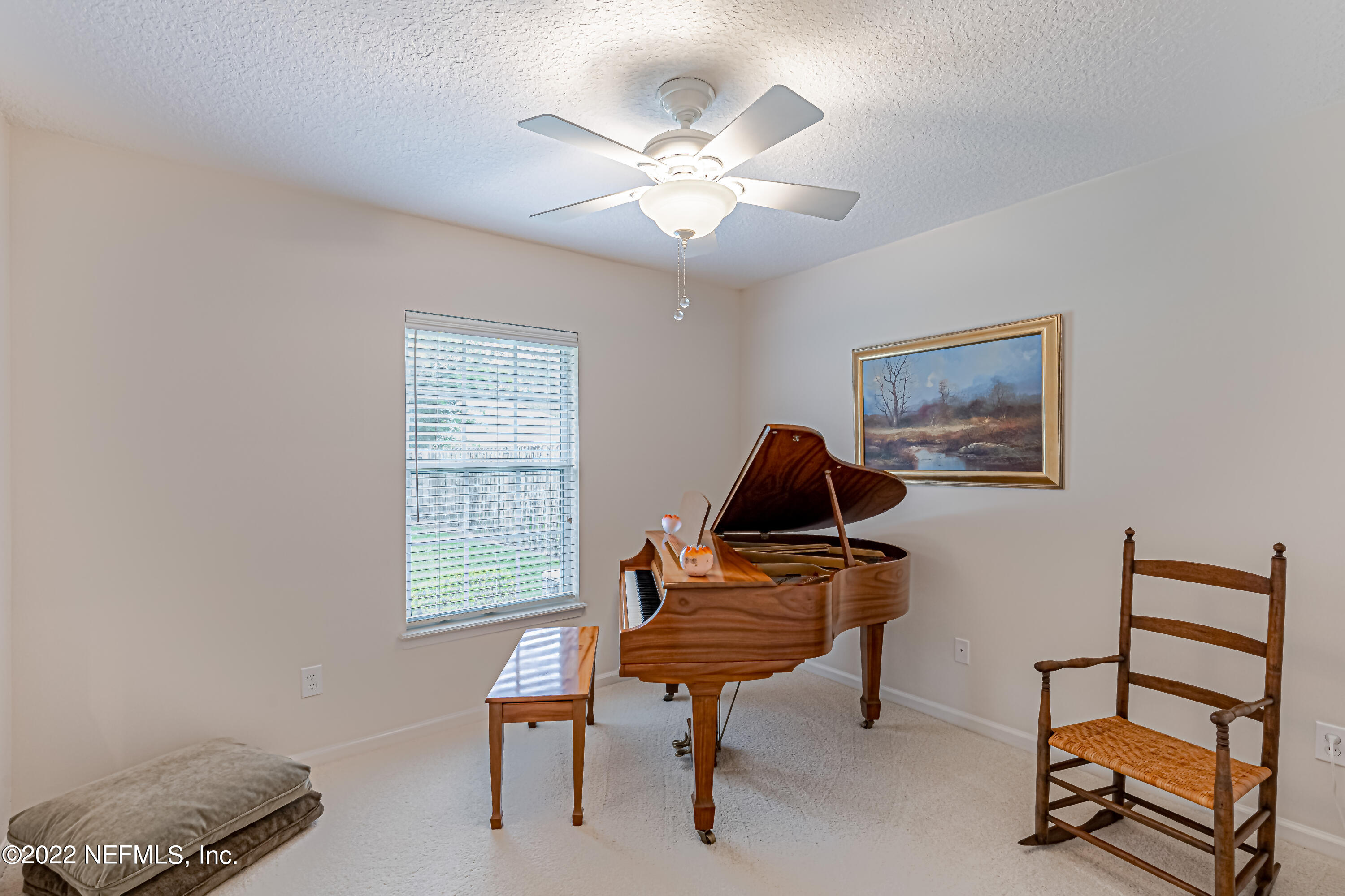 124 Dragonfly Drive Jacksonville, FL 32259 - Photo 29 of 40 a living room with furniture and a window