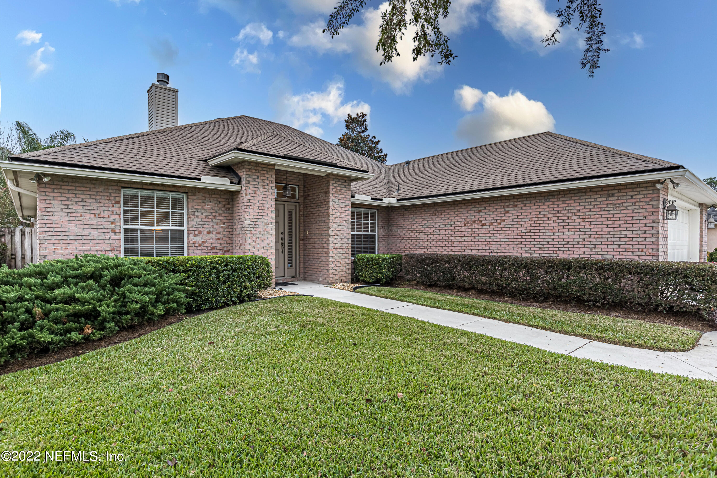 124 Dragonfly Drive Jacksonville, FL 32259 - Photo 3 of 40 a front view of a house with garden