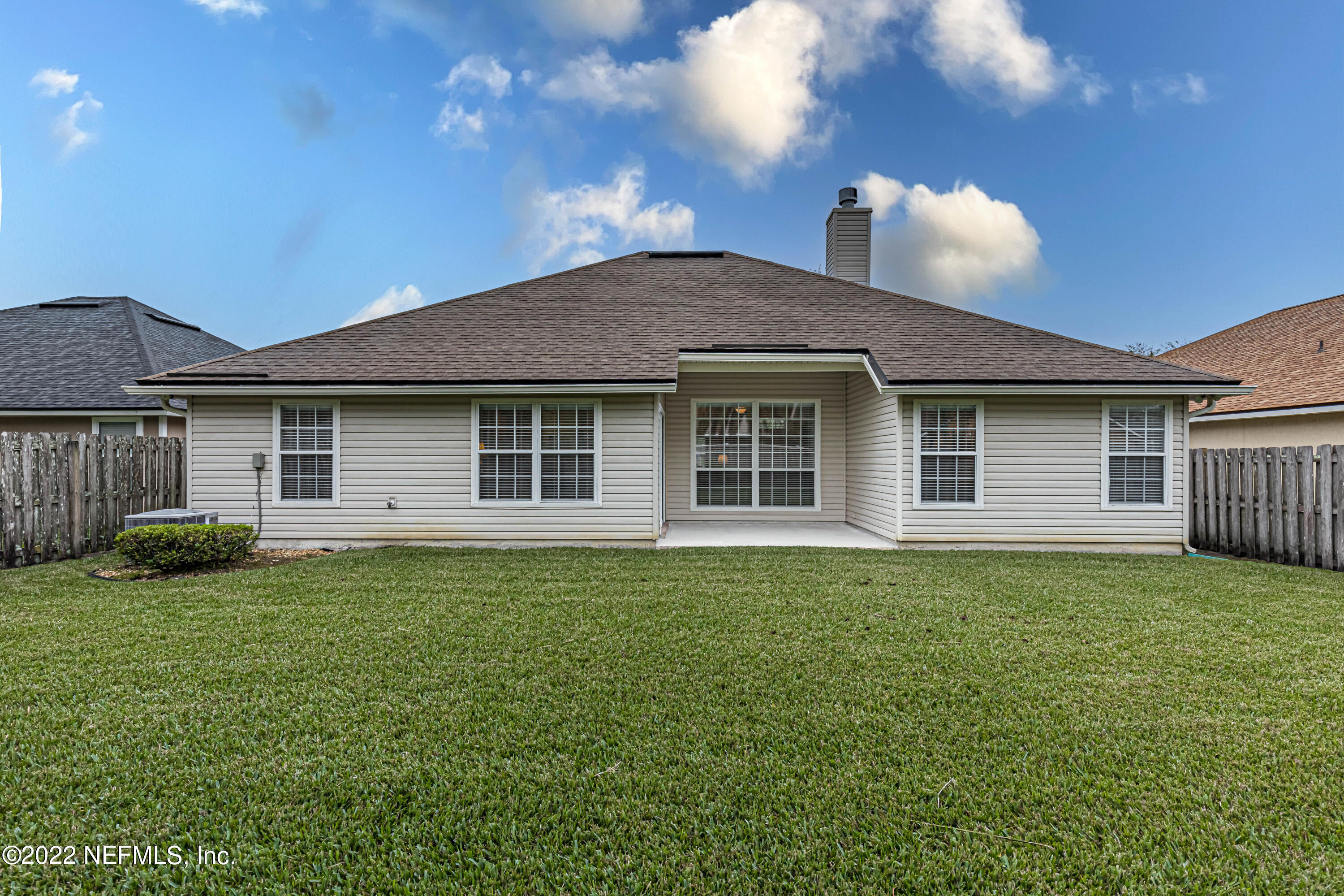 124 Dragonfly Drive Jacksonville, FL 32259 - Photo 36 of 40 a front view of a house with a garden