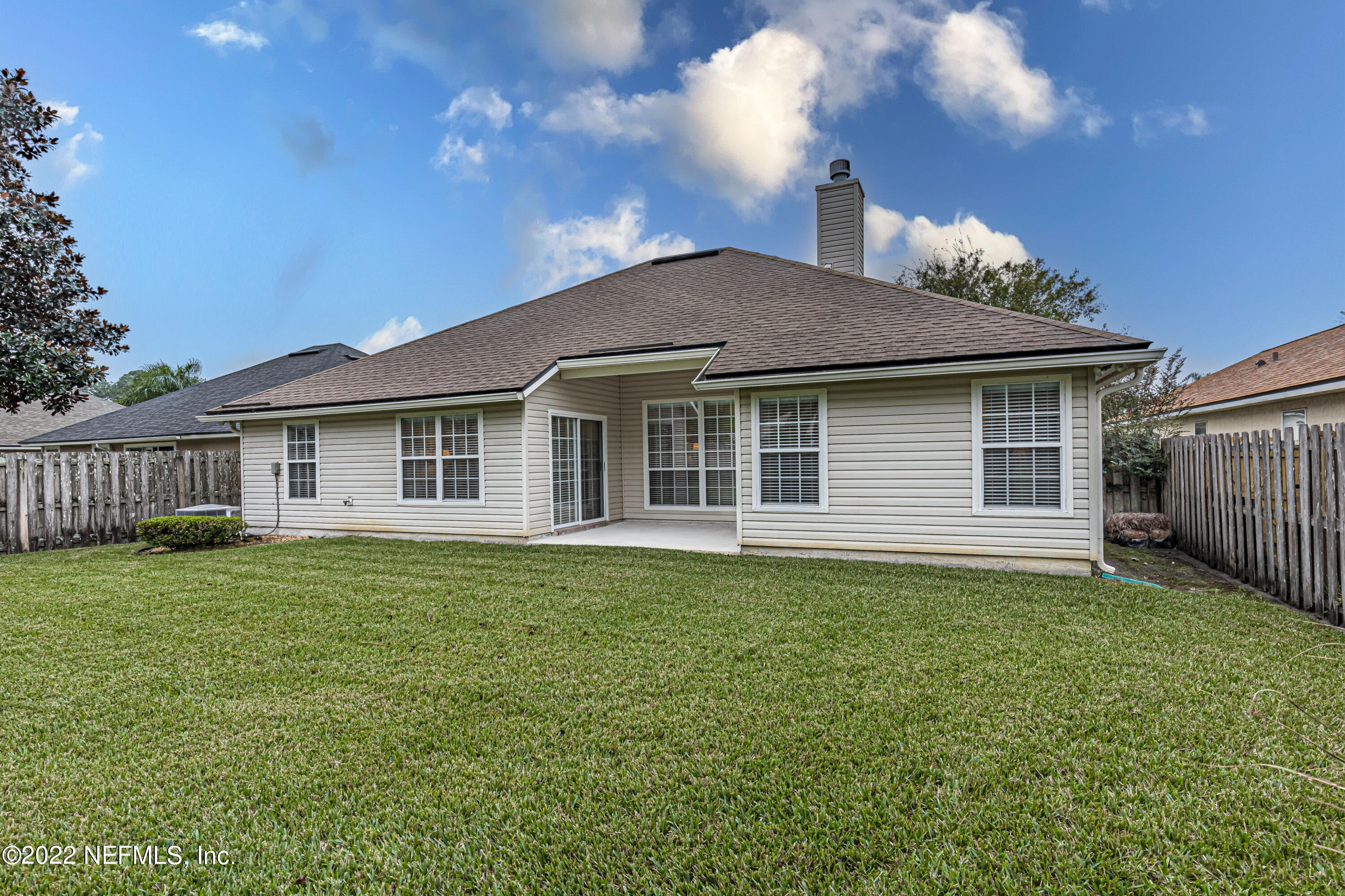 124 Dragonfly Drive Jacksonville, FL 32259 - Photo 37 of 40 a front view of a house with a garden