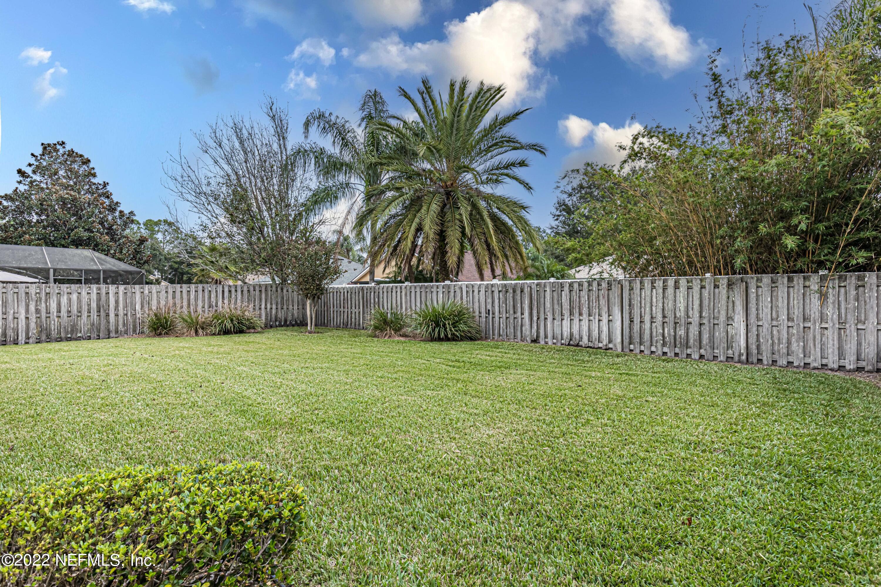 124 Dragonfly Drive Jacksonville, FL 32259 - Photo 39 of 40 a view of a yard with wooden fence