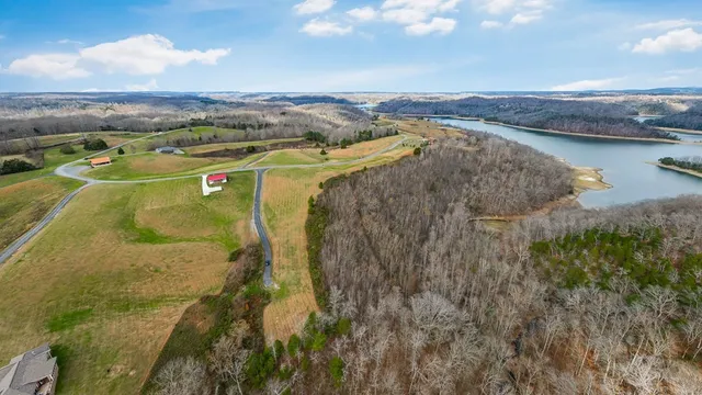 a front view of a house with garden and porch