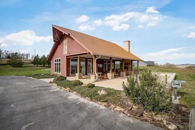 a view of a pathway with a yard