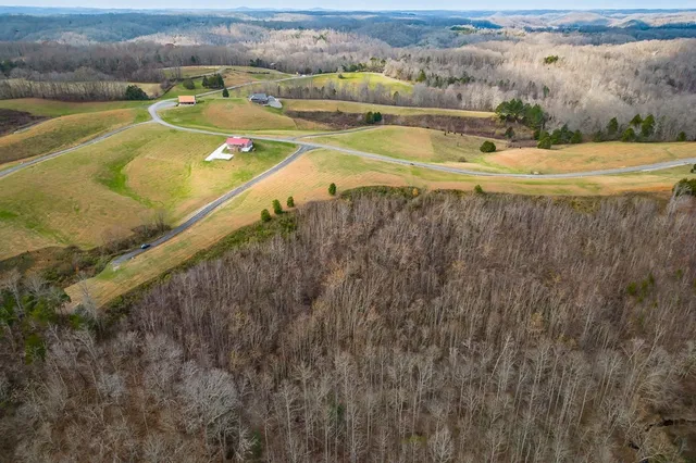 a view of a swimming pool with an ocean view