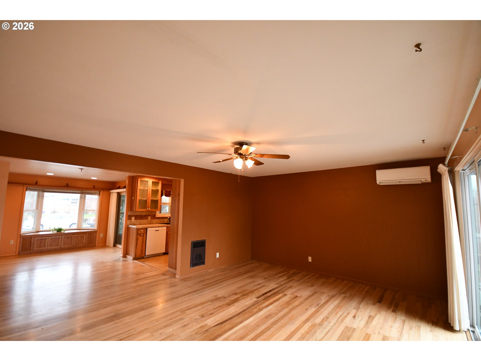 731 East 19th Street The Dalles, OR 97058 - Photo 12 of 42 a view of an empty room with a window