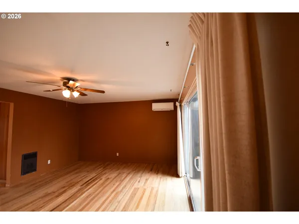 a very nice looking room with a ceiling fan