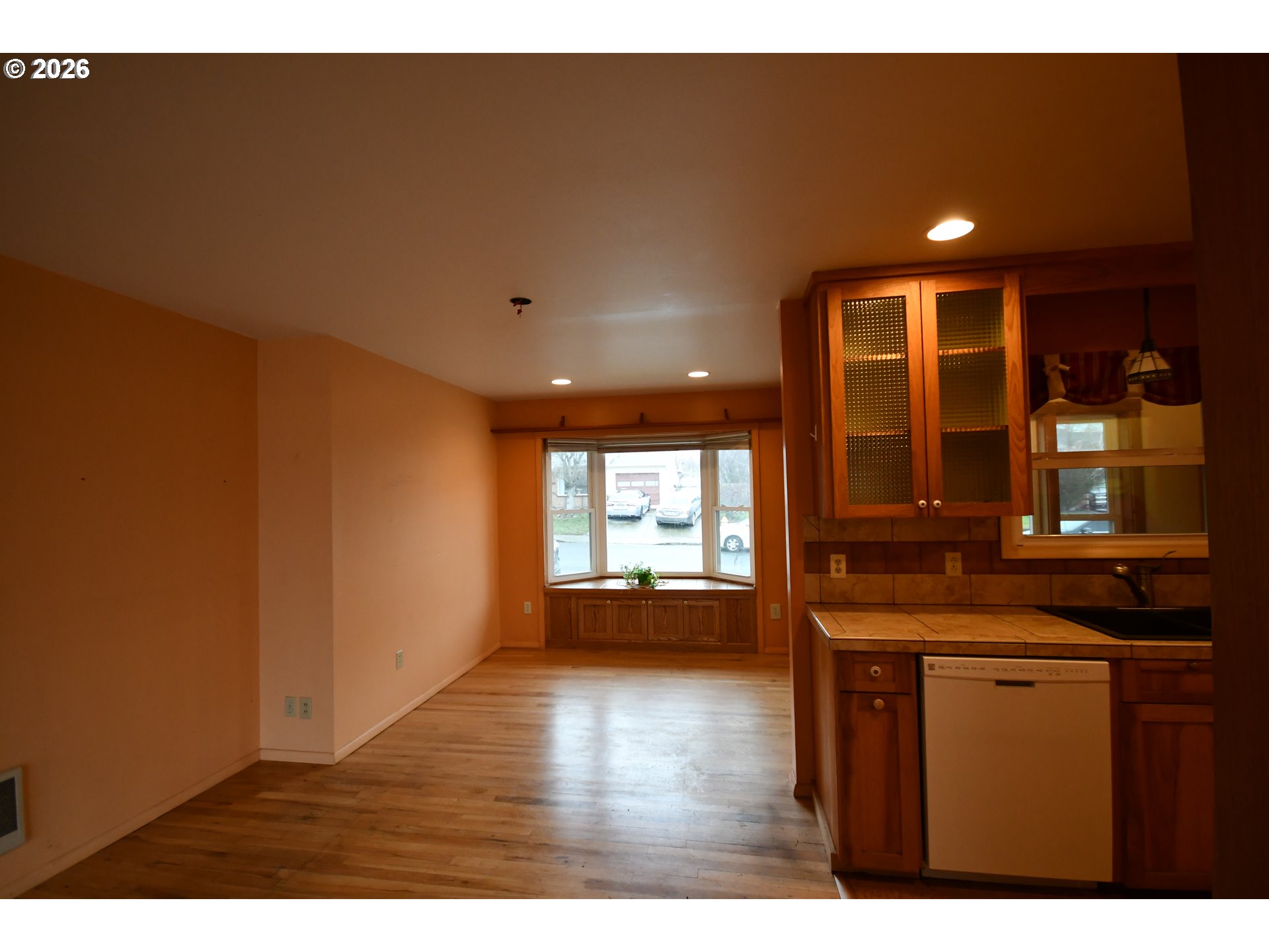 731 East 19th Street The Dalles, OR 97058 - Photo 15 of 42 a kitchen with a sink and wooden floor