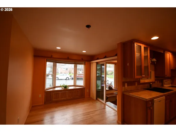 a kitchen with sink and window