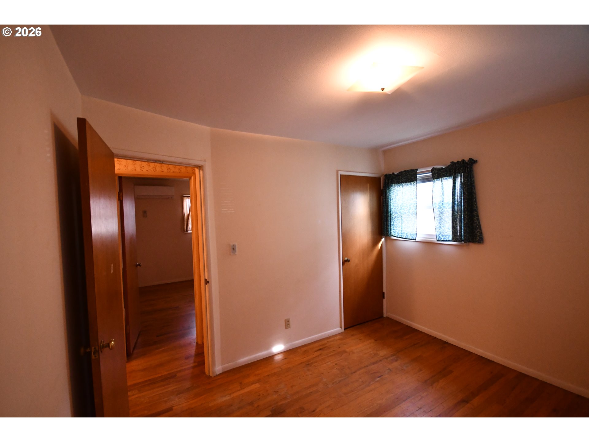 731 East 19th Street The Dalles, OR 97058 - Photo 31 of 42 a view of an empty room and window