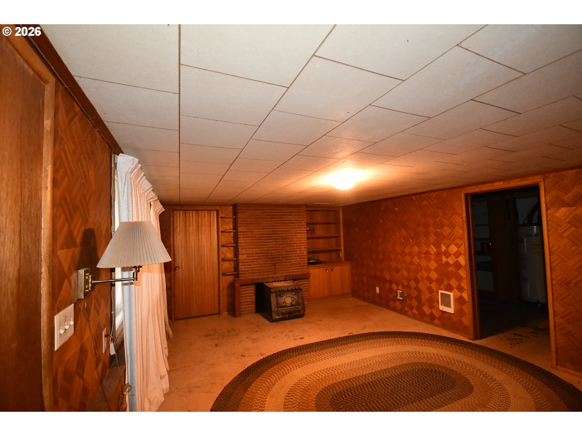 731 East 19th Street The Dalles, OR 97058 - Photo 38 of 42 a bedroom with furniture and a window