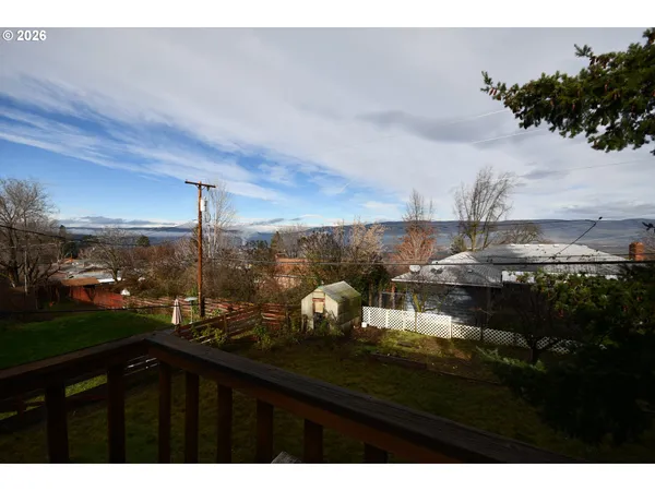 a aerial view of a house with a garden and plants