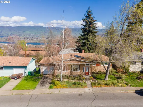 an aerial view of a house with a garden