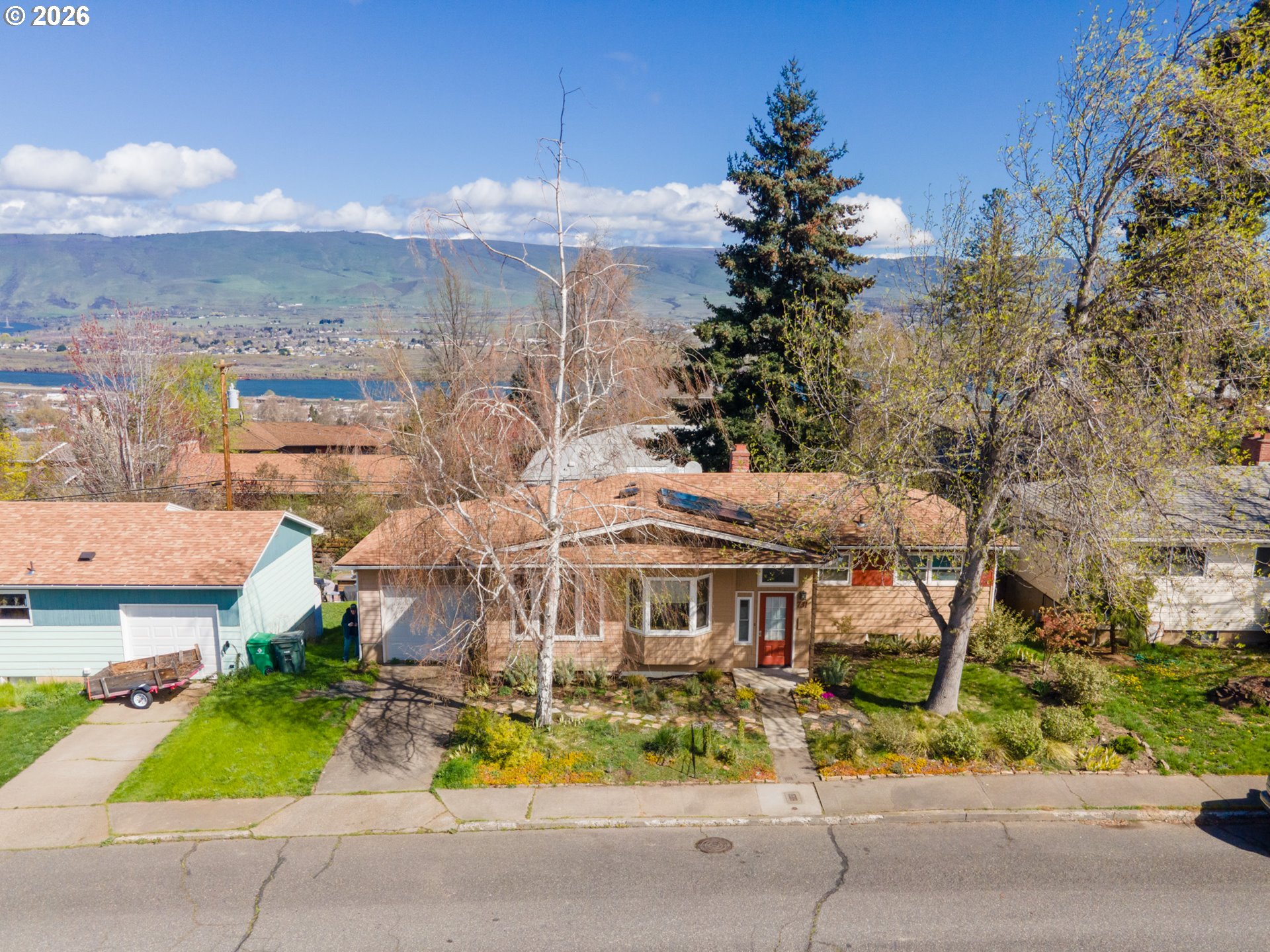 731 East 19th Street The Dalles, OR 97058 - Photo 43 of 46 a aerial view of a house with a garden and plants