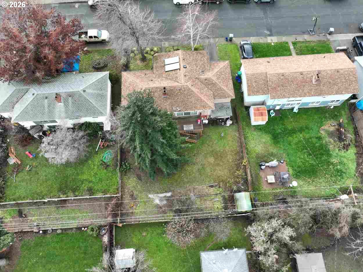 731 East 19th Street The Dalles, OR 97058 - Photo 5 of 42 an aerial view of a house with a yard