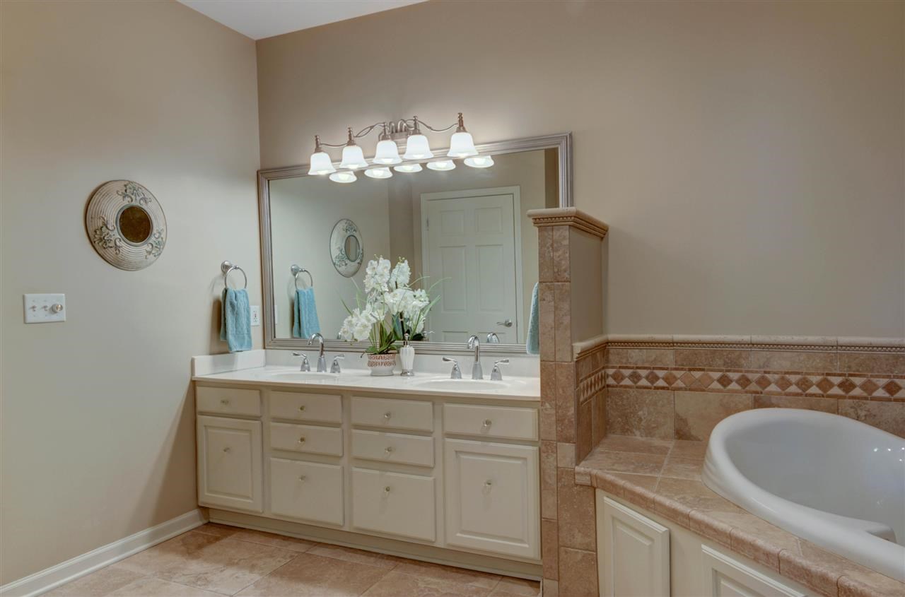 12210 Bellingham Road Caledonia, IL 61011 - Photo 12 of 24 a bathroom with a sink and a mirror