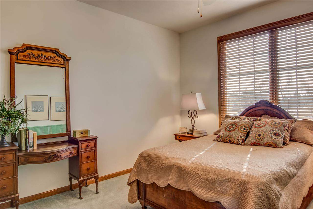 12210 Bellingham Road Caledonia, IL 61011 - Photo 17 of 24 a bedroom with a bed and a window