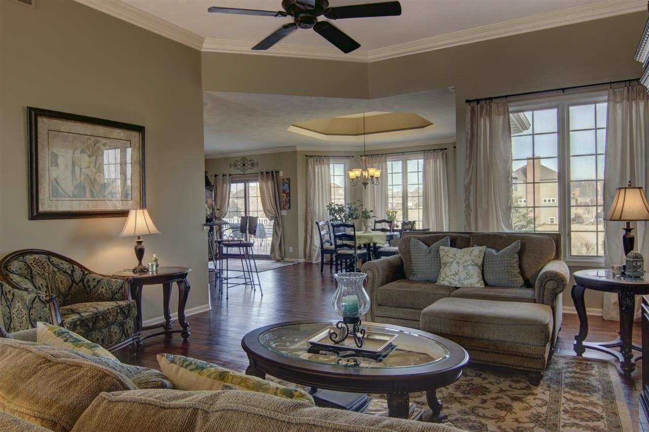 12210 Bellingham Road Caledonia, IL 61011 - Photo 2 of 24 a living room with furniture and a wooden floor