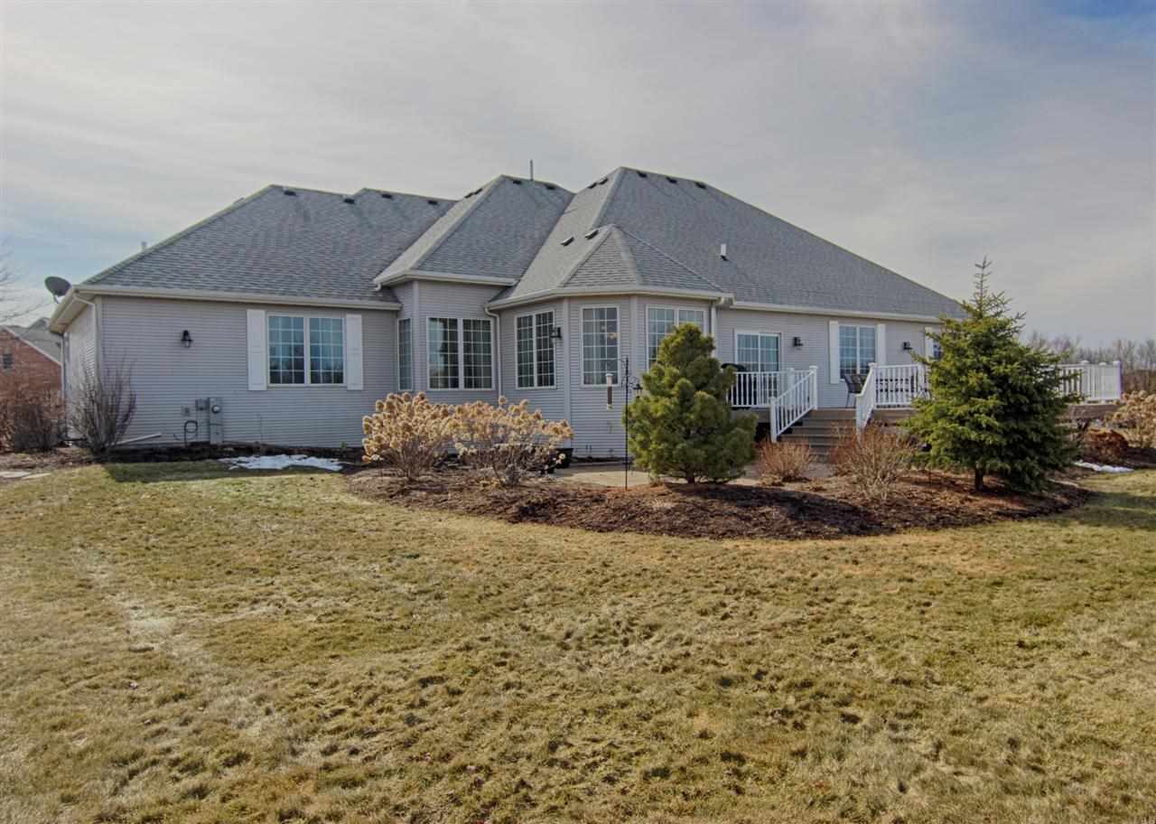 12210 Bellingham Road Caledonia, IL 61011 - Photo 24 of 24 a front view of a house with a garden