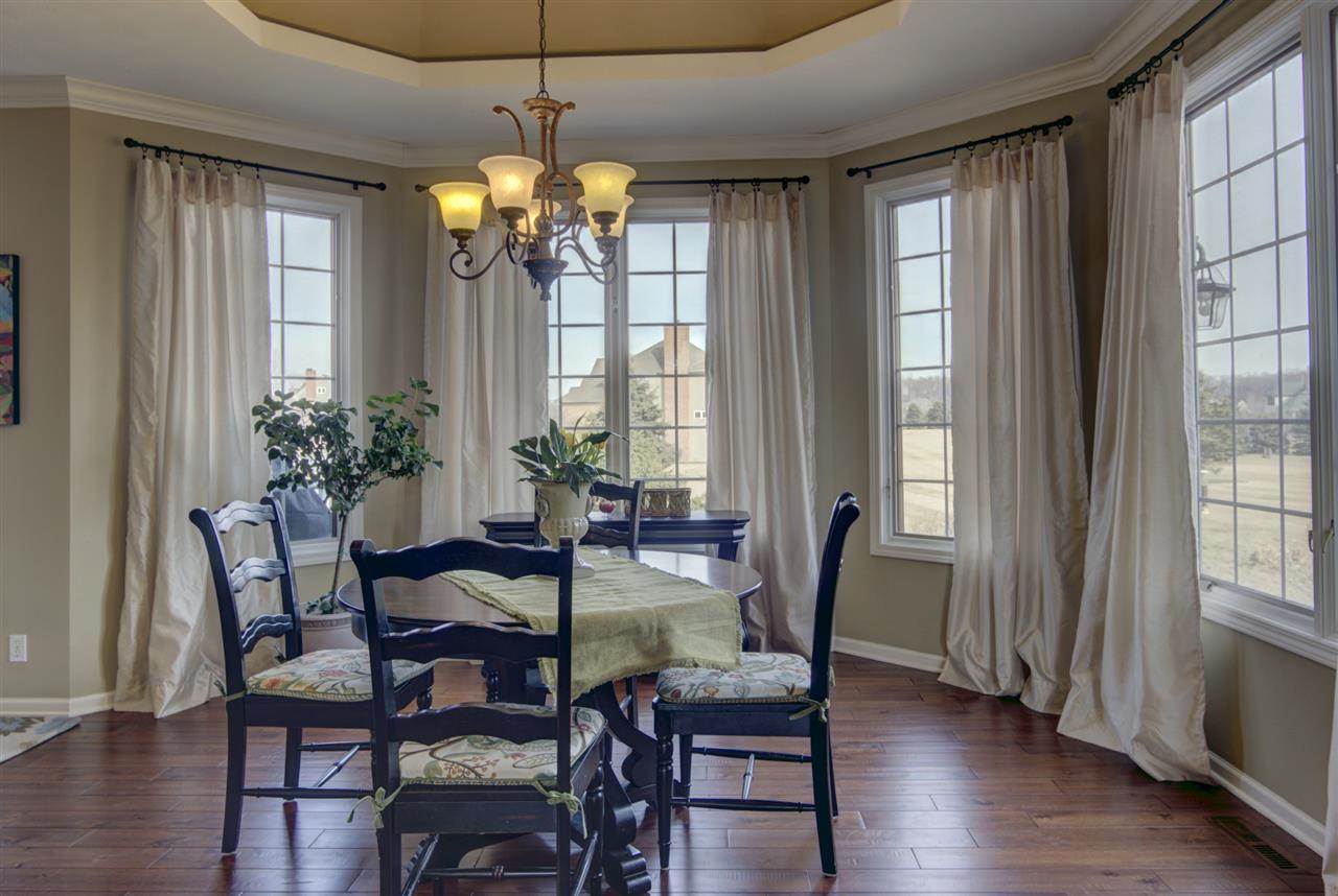 12210 Bellingham Road Caledonia, IL 61011 - Photo 4 of 24 a view of a dining room with furniture and window