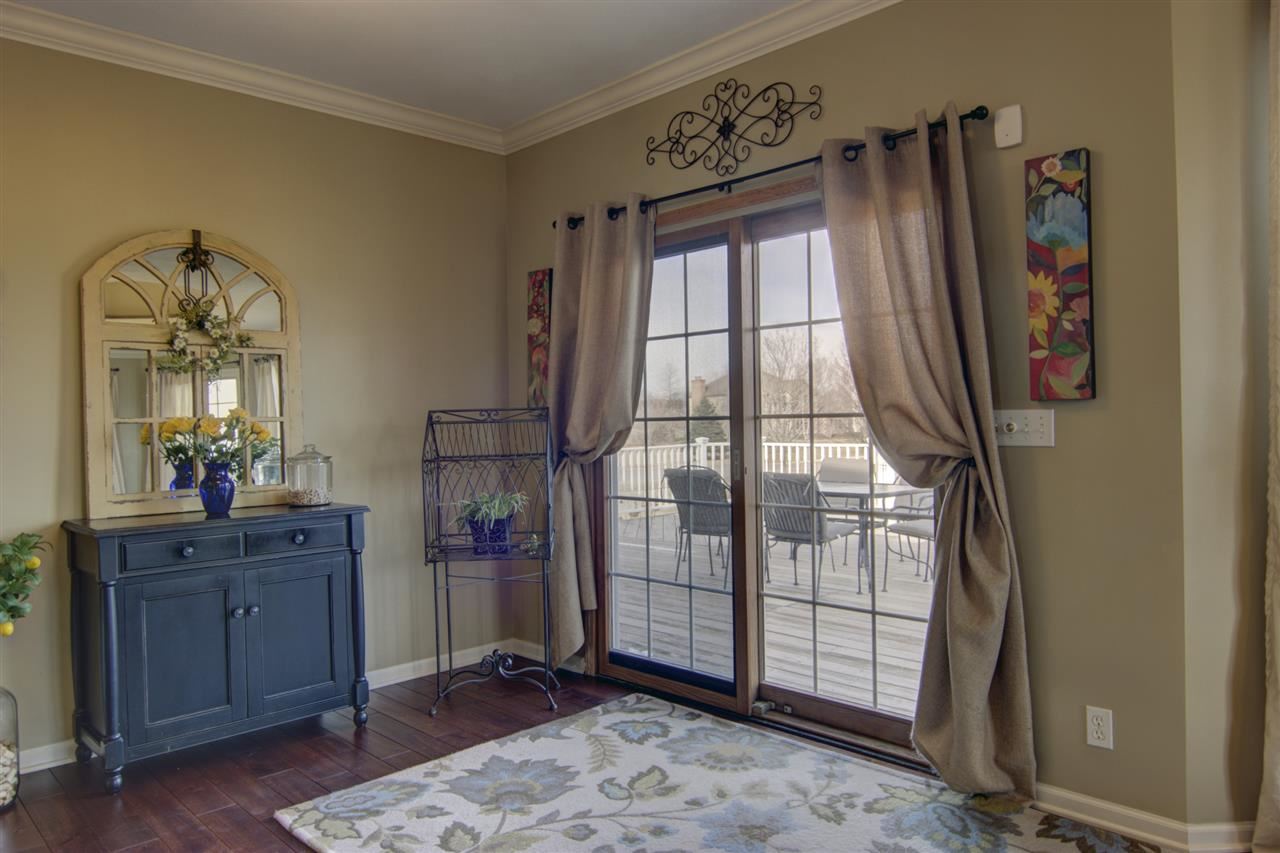 12210 Bellingham Road Caledonia, IL 61011 - Photo 7 of 24 a view of a livingroom with furniture and a window