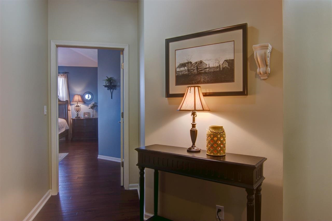 12210 Bellingham Road Caledonia, IL 61011 - Photo 9 of 24 a view of a hallway with a wooden floor