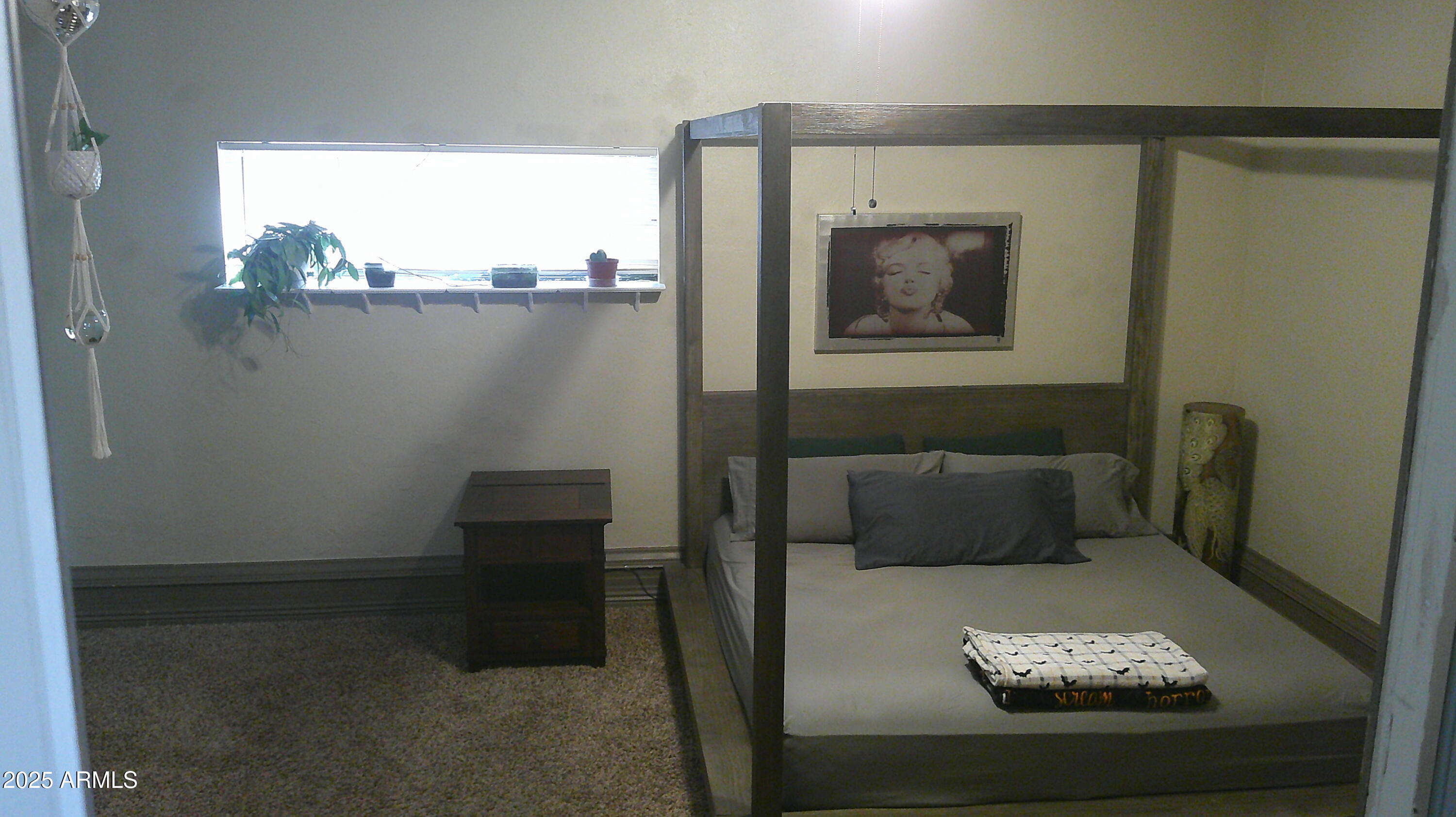 44 South 3rd Street West Snowflake, AZ 85937 - Photo 31 of 70 a view of a hallway with a chair and potted plant on a table