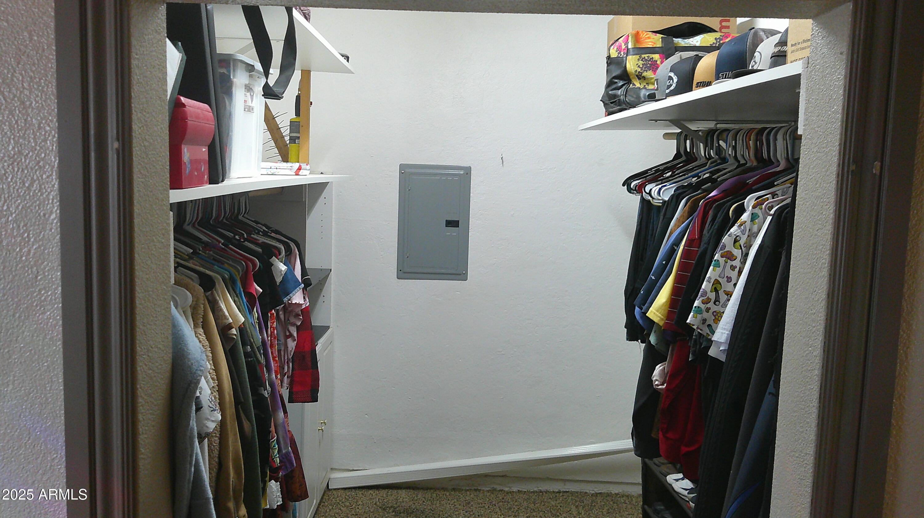 44 South 3rd Street West Snowflake, AZ 85937 - Photo 33 of 70 a view of walk in closet with clothes and shoes