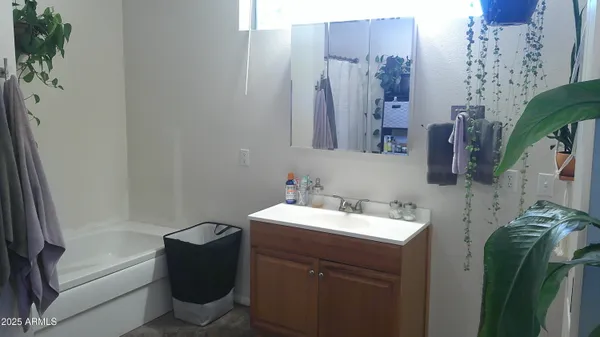 a view of storage and utility room with empty racks