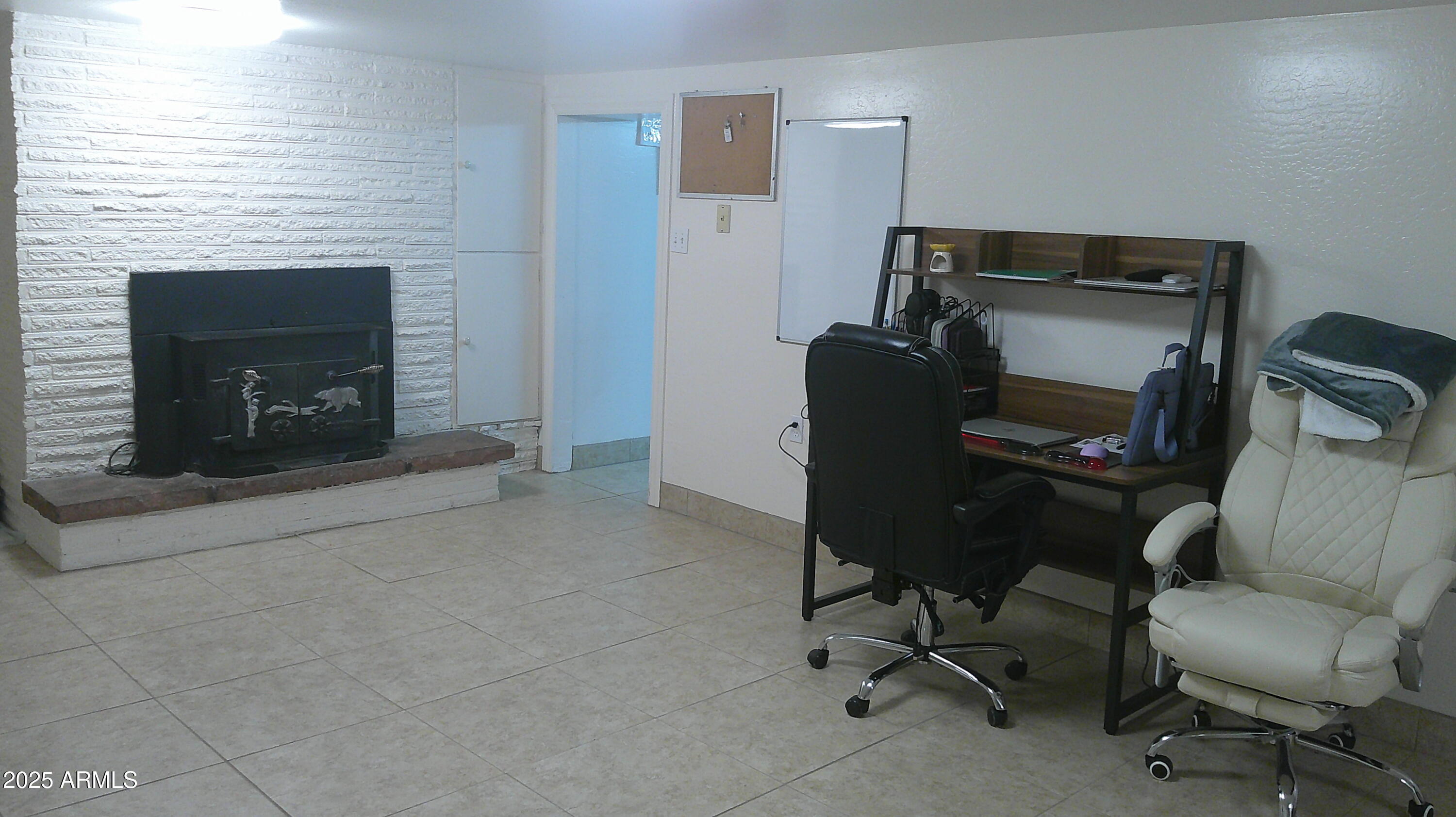 44 South 3rd Street West Snowflake, AZ 85937 - Photo 40 of 70 a view of a workspace with furniture and a fireplace