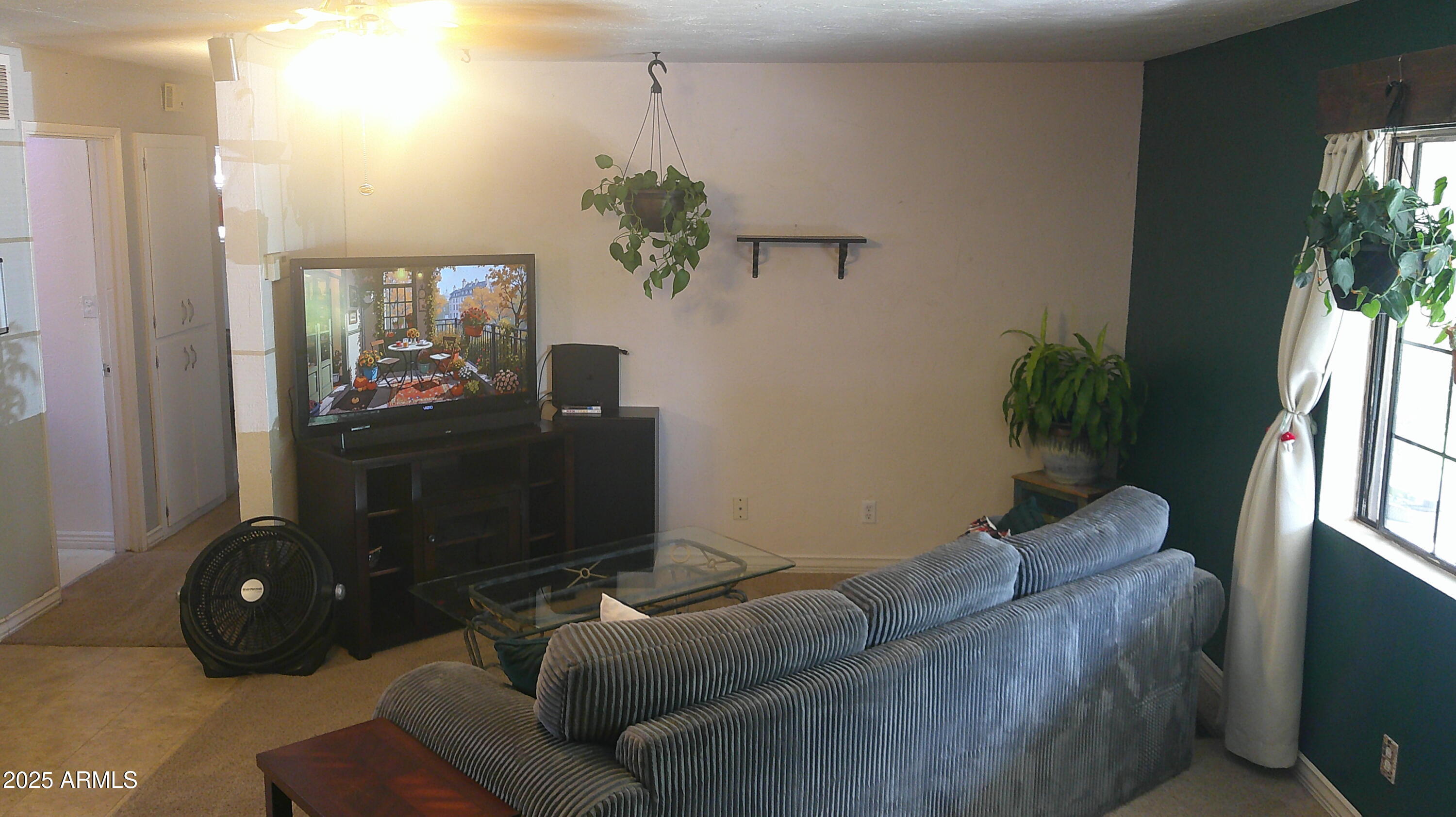 44 South 3rd Street West Snowflake, AZ 85937 - Photo 7 of 70 a living room with furniture and a flat screen tv