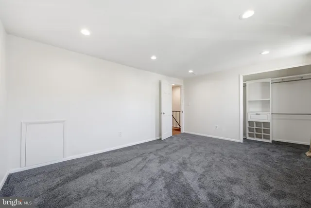 an empty room with windows