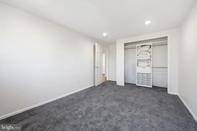 an empty room with a hallway