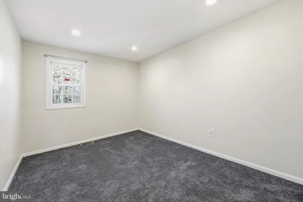 an empty room with a empty shelves