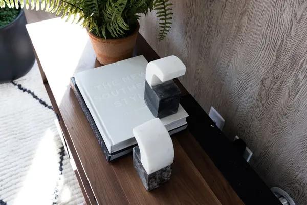 a kitchen with refrigerator cabinets dining table and chairs