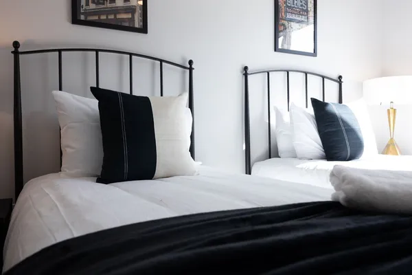 a view of hallway with wooden floor