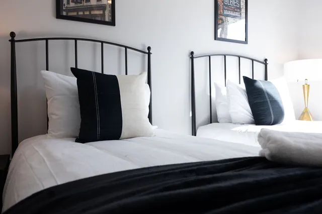 a view of hallway with wooden floor