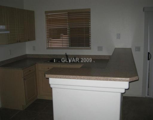 8823 Roping Rodeo Avenue, Unit 102 Las Vegas, NV 89178 - Photo 2 of 8 Kitchen.